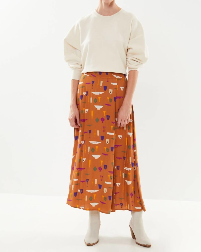 Front of a model wearing a size Large Chi Vase Print Skirt In Ocre Multi in Ocre Multi by FRNCH. | dia_product_style_image_id:351439